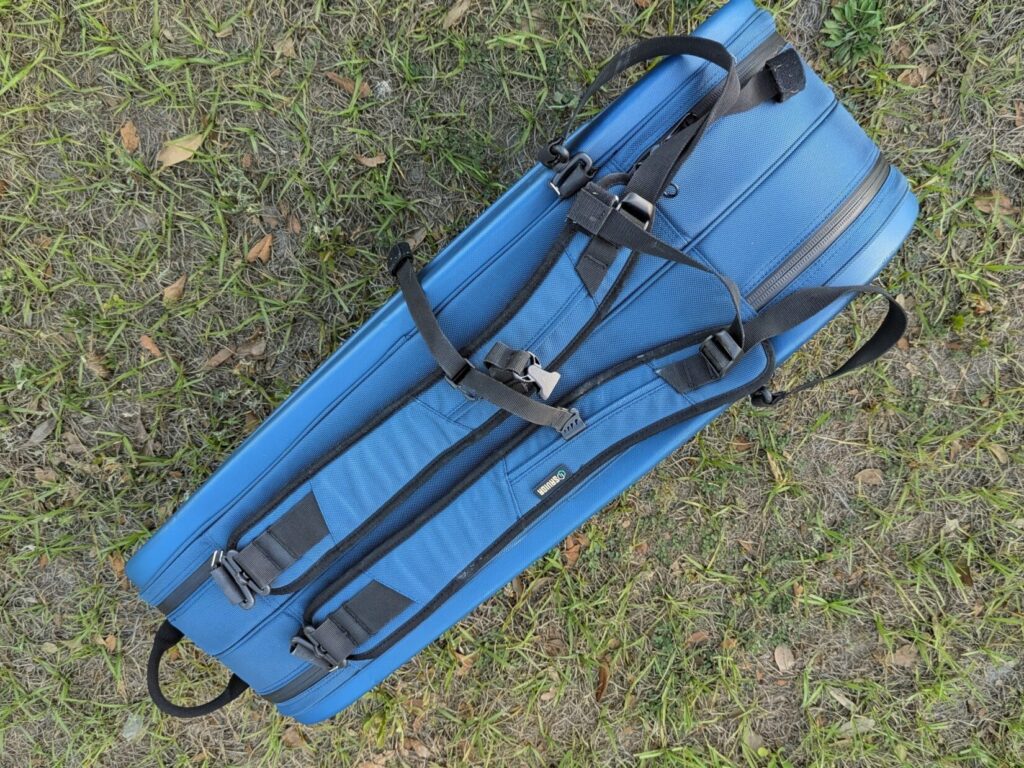 The back of the Savior case showing the adjustable, padded backpack straps and sternum strap.