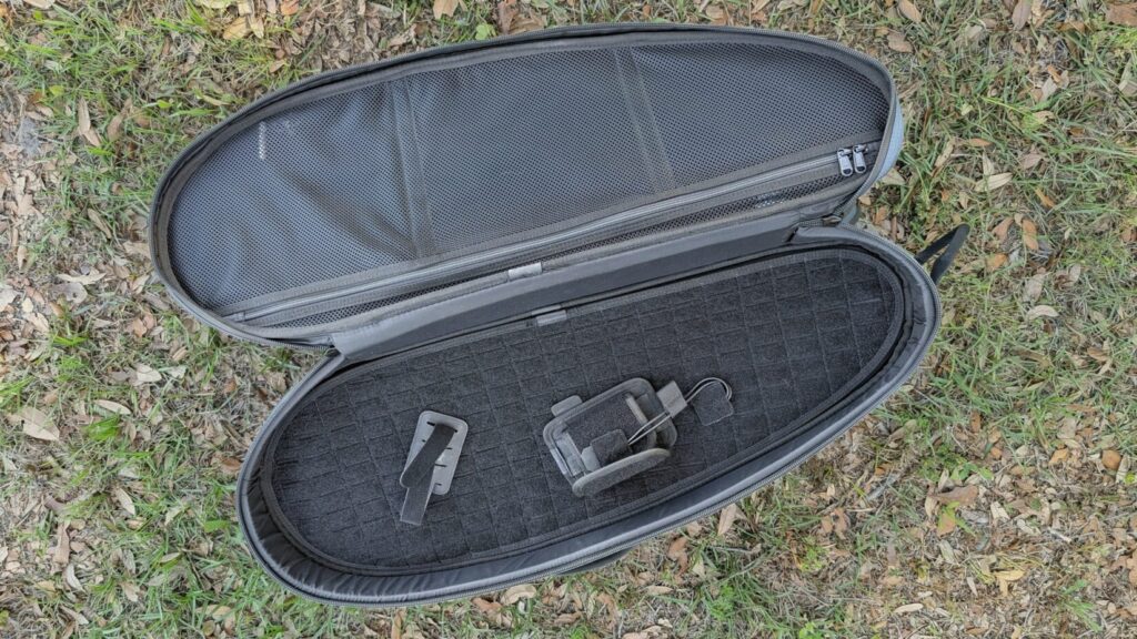 Top-down view of the empty Savior case showing the internal mesh pockets and the Velcro-compatible lining.