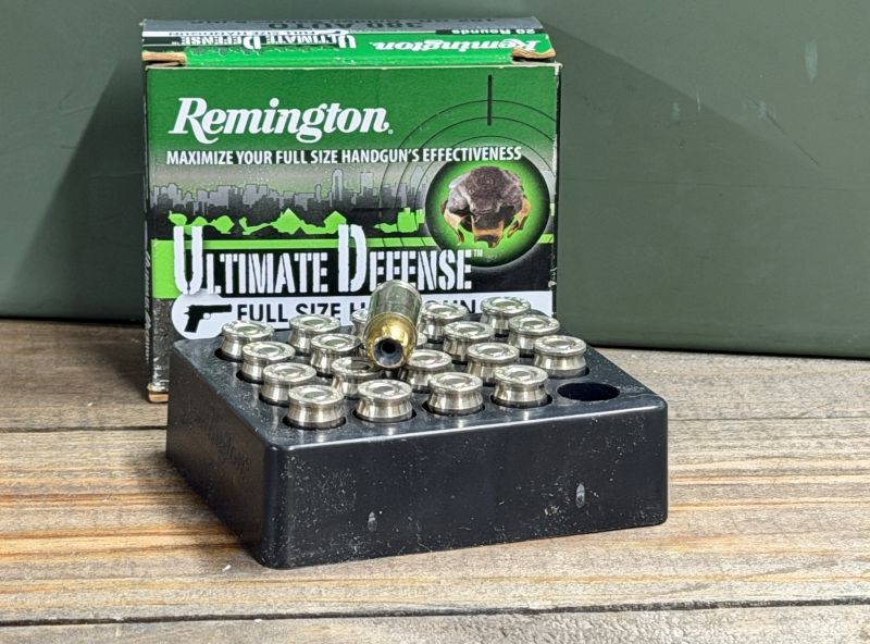 Ammunition with a green Remington box sitting behind it. 