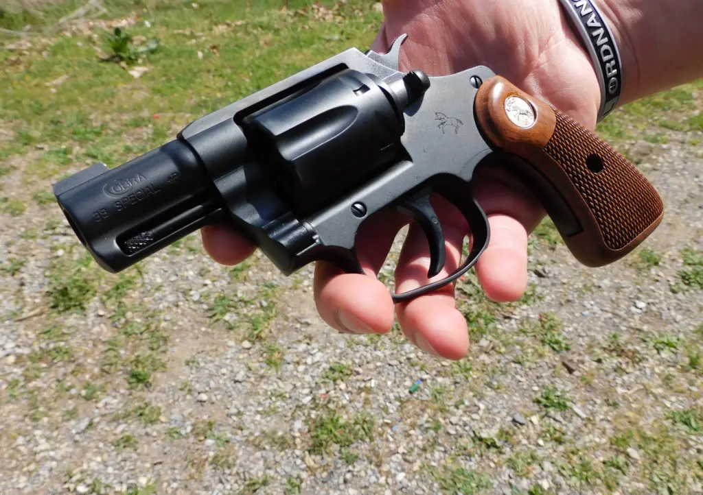 A Colt Night Cobra Special revolver on a man's hand