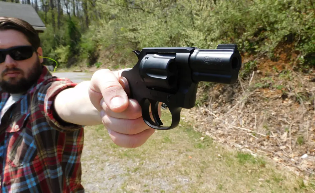 Man pointing a revolver