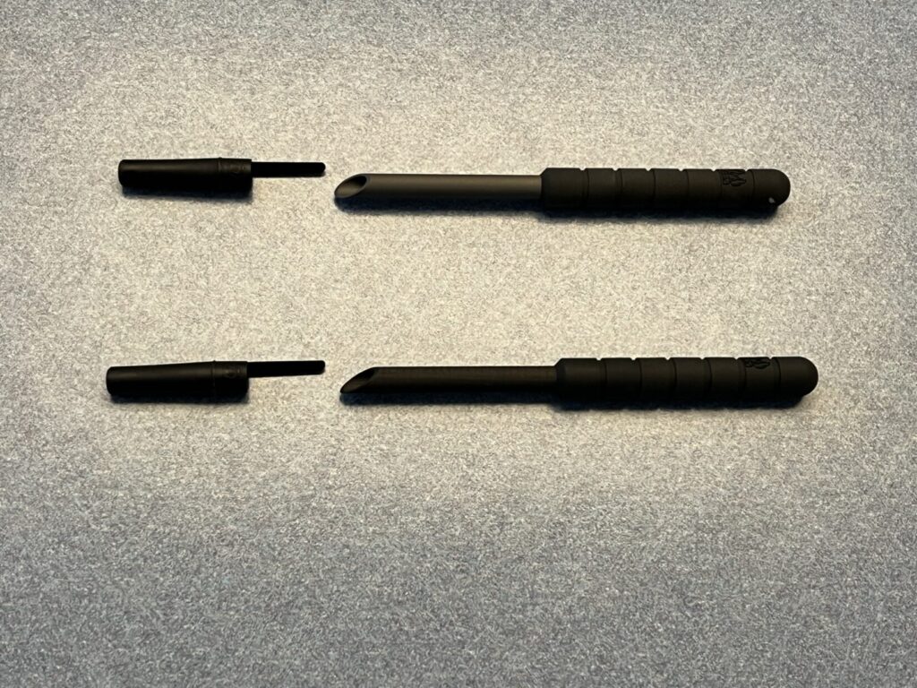 Two hollow straw-like devices designed for letting air out of tires.