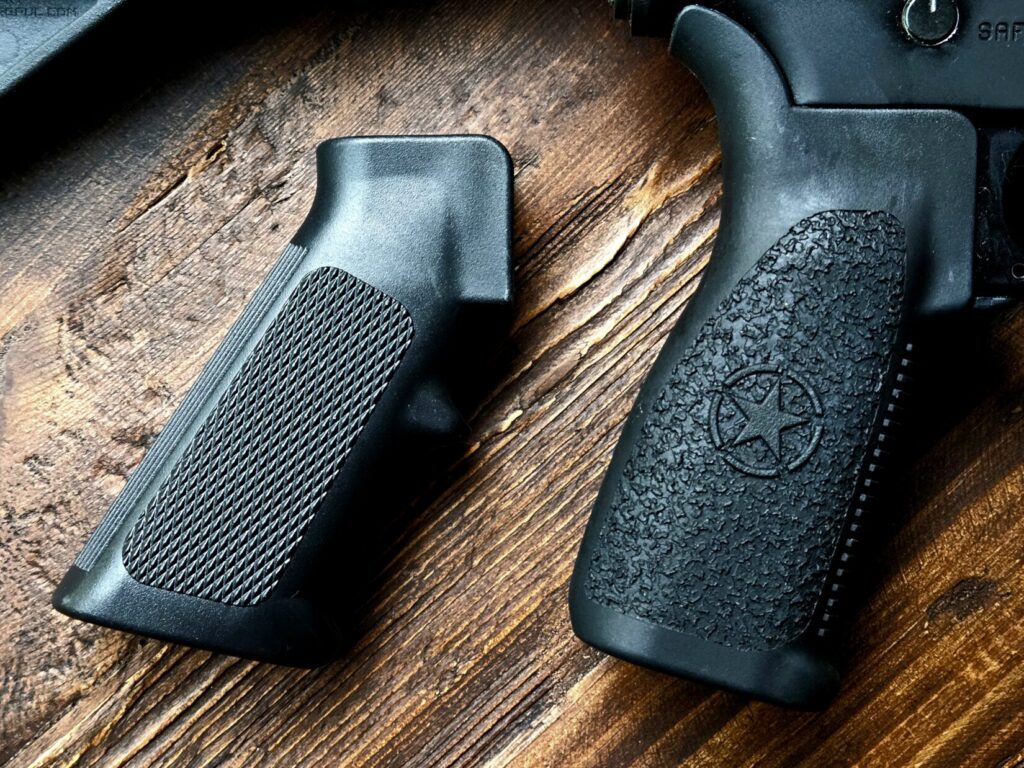 A standard AR15 grip next to a more ergonomic grip.