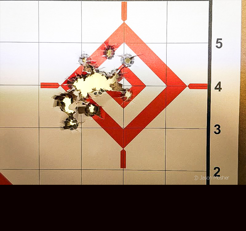 A target with holes in the center.