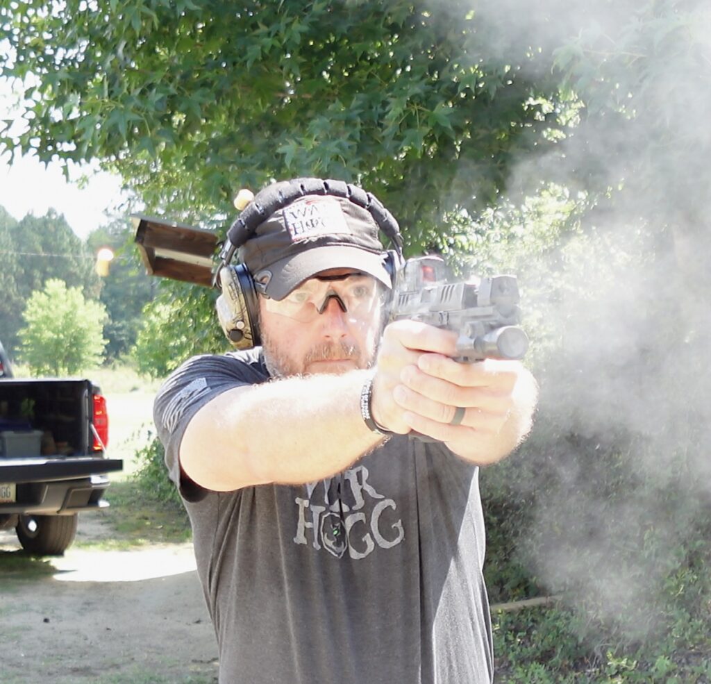 rick hogg of War HOGG Tactical practices his trigger finger placement during a live fire exercise 