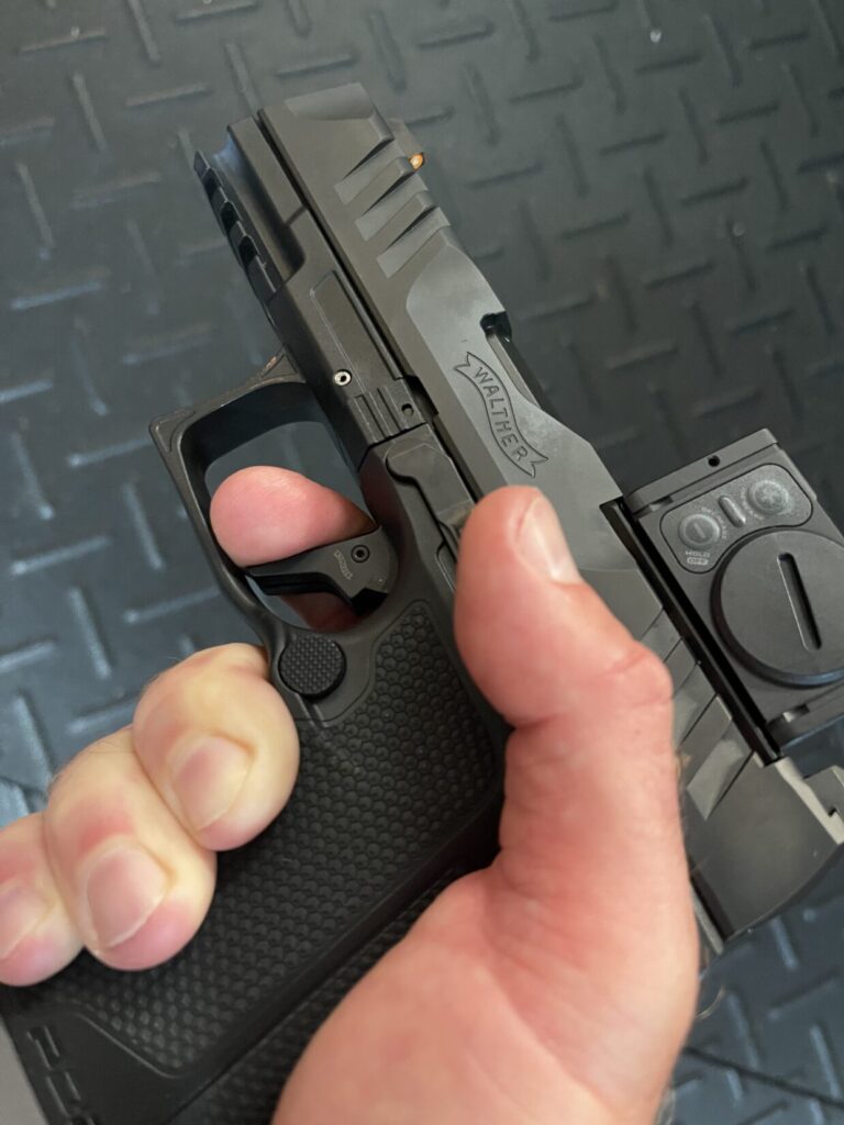 Pictured is Rick Hogg of War HOGG Tactical demonstrating trigger finger placement at the bottom of the trigger and on the trigger guard