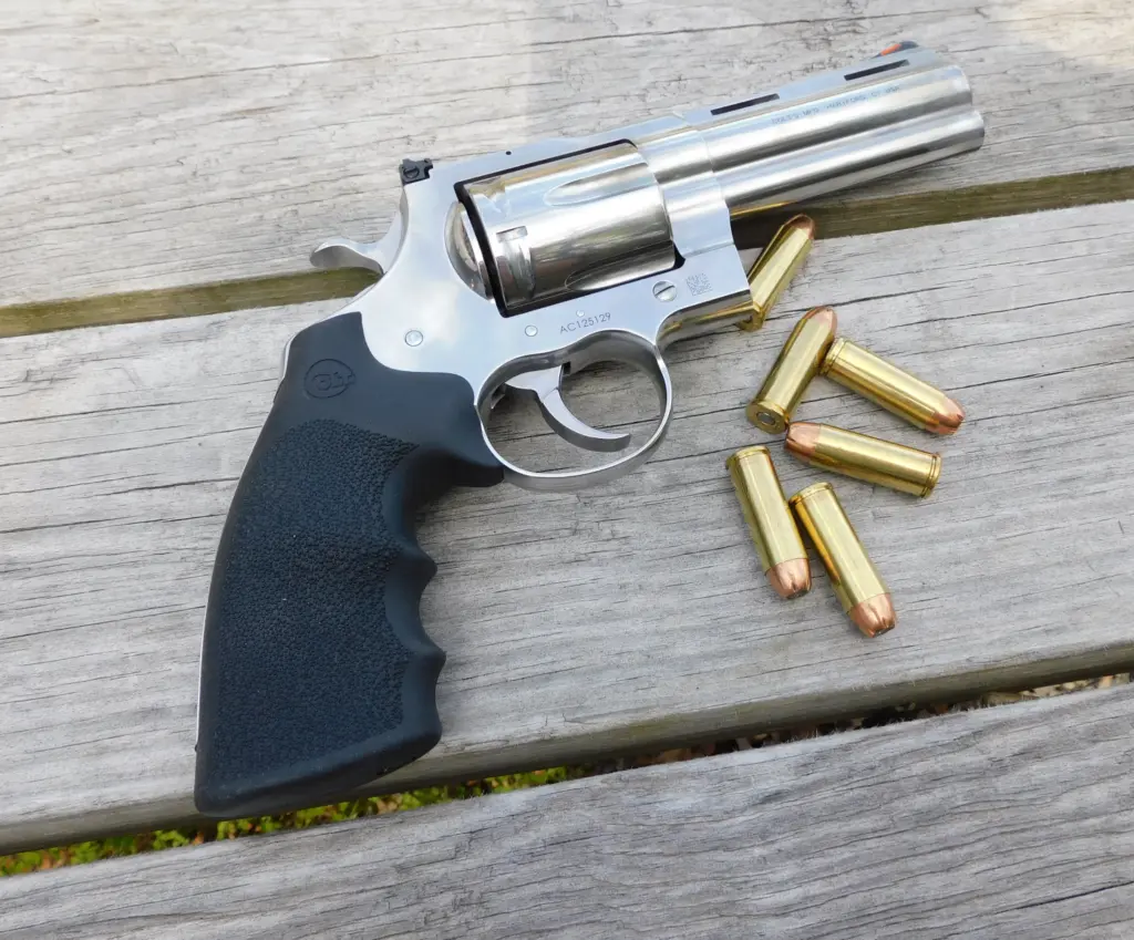 Colt Anaconda revolver with six ammunition cartridges