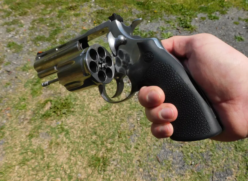 Colt Anaconda revolver with an open cylinder.