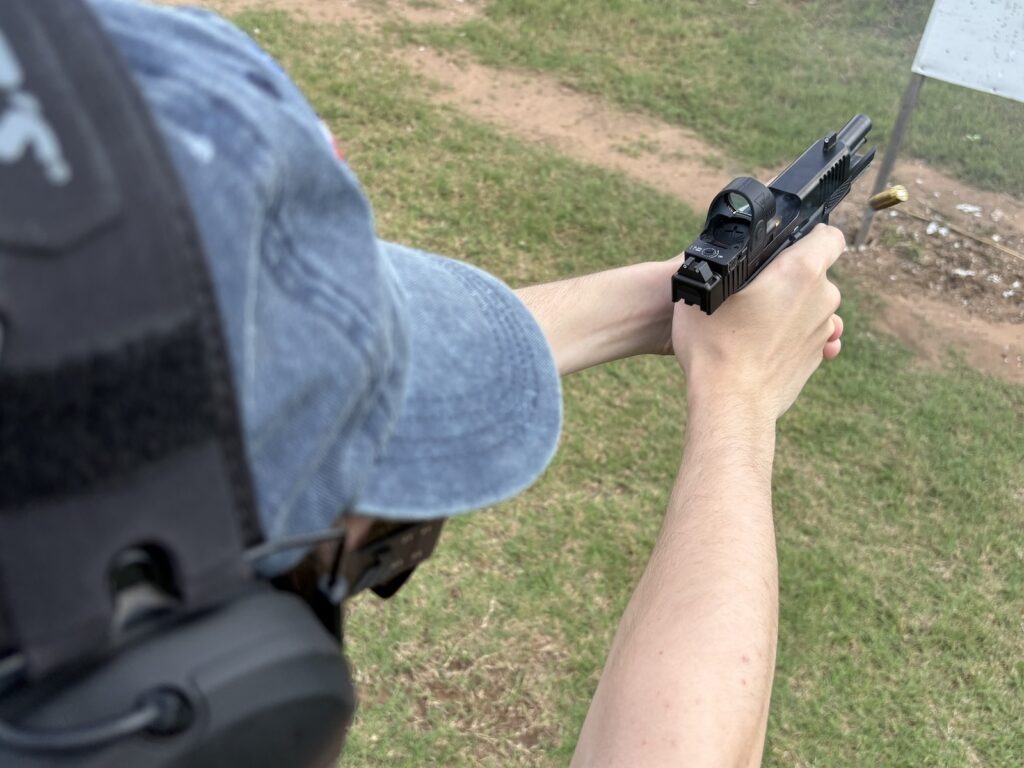 a shooter shooting a G45 with an SRO optic.