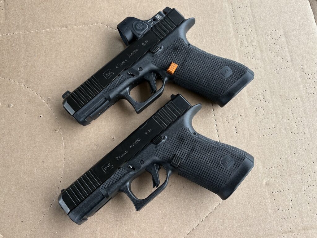 A Gen 6 G45 with an SRO and an upgraded mag release above a Gen 6 G19. Apart from the grip length, they are indistinguishable.