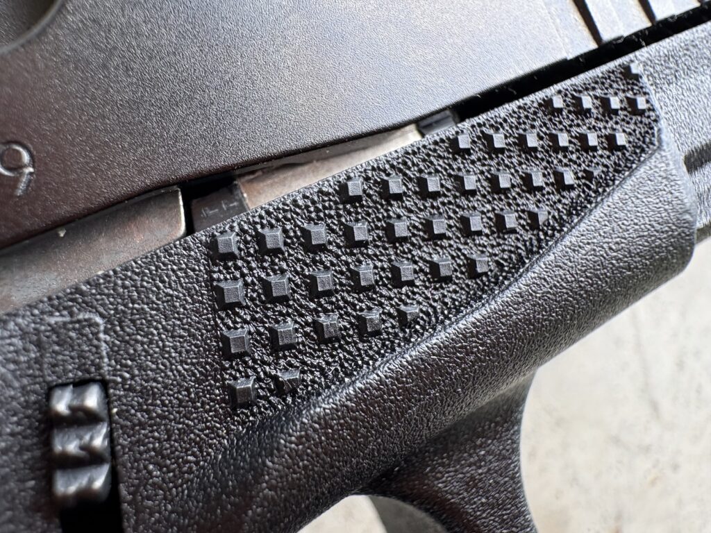 nubs and texture on a gen 6 glock frame where you put the support hand thumb
