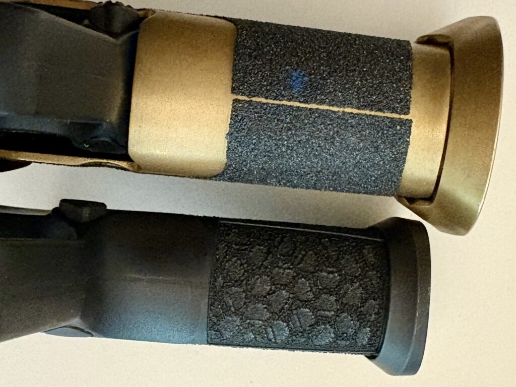 the two gun grips side by side for size comparison