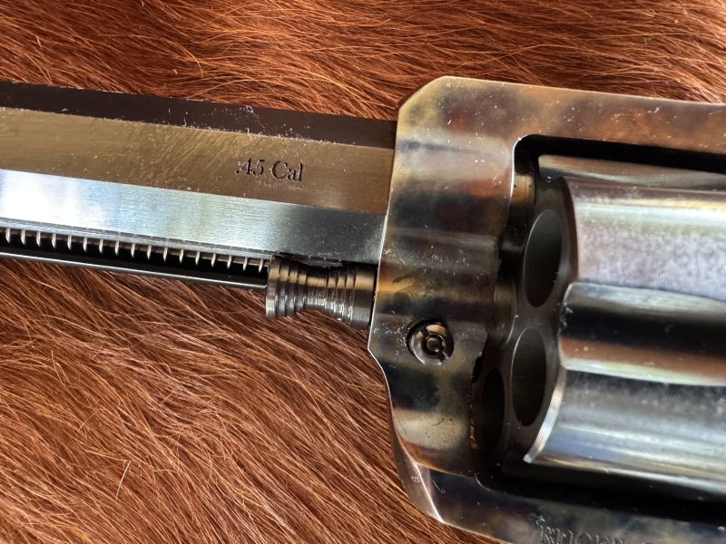 The "Brasshawk" is marked ".45 Cal." and comes with cylinders in 45 Colt and 45 ACP. The Skinner Sights Belt Mountain Base Pin is used on these custom guns.