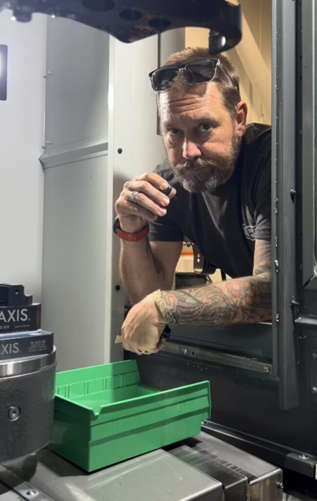 Buck Holly in one of his machines