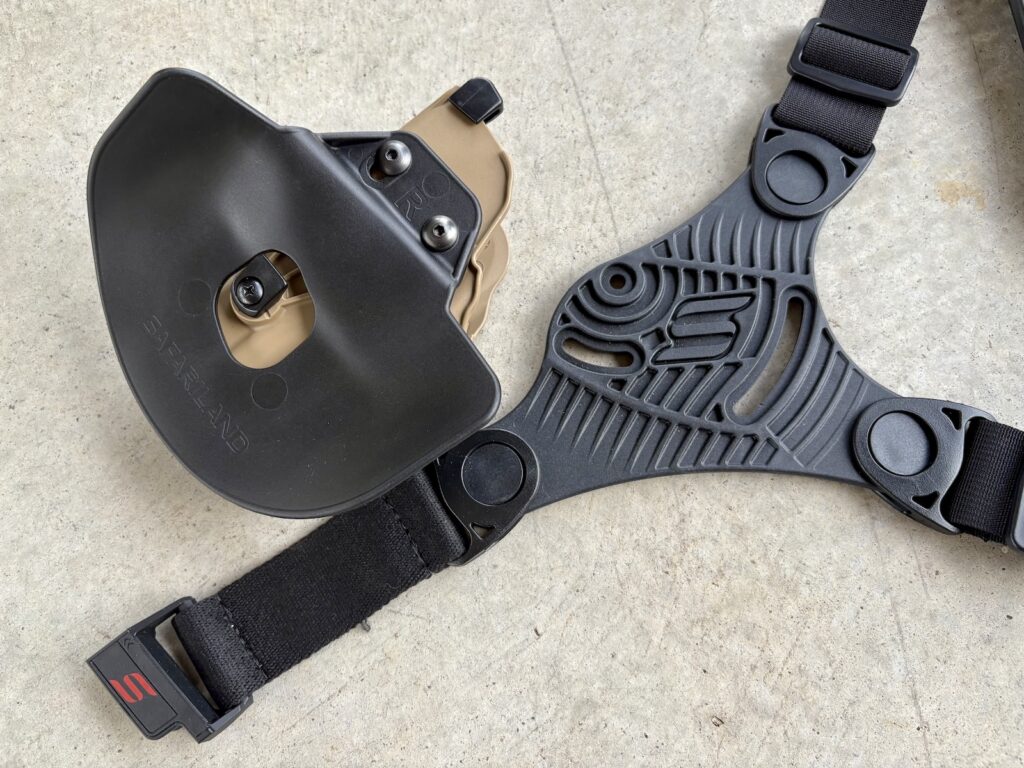 Safariland makes a chest rig. It is a minimalist design meant to connect to any of their three-hole-pattern mounts (so all 6TS, 7TS, Solis, etc.).