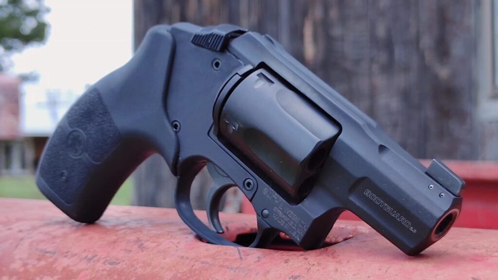 An extreme close-up, angled view of the black Bodyguard 2.0 revolver highlighting the trigger guard, cylinder, and frame textures.
