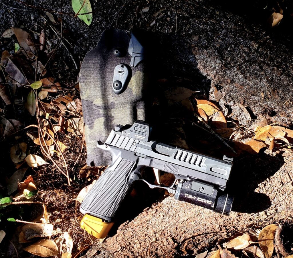 an ace 365 311 and a safariland 6000 series rds holster