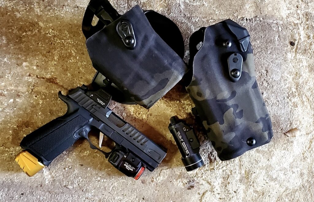 A 6354RDS and a 6378RDSC. The RDS holster has an optics lid and can fit the TLR-1. The RDSC is for the TLR-7.