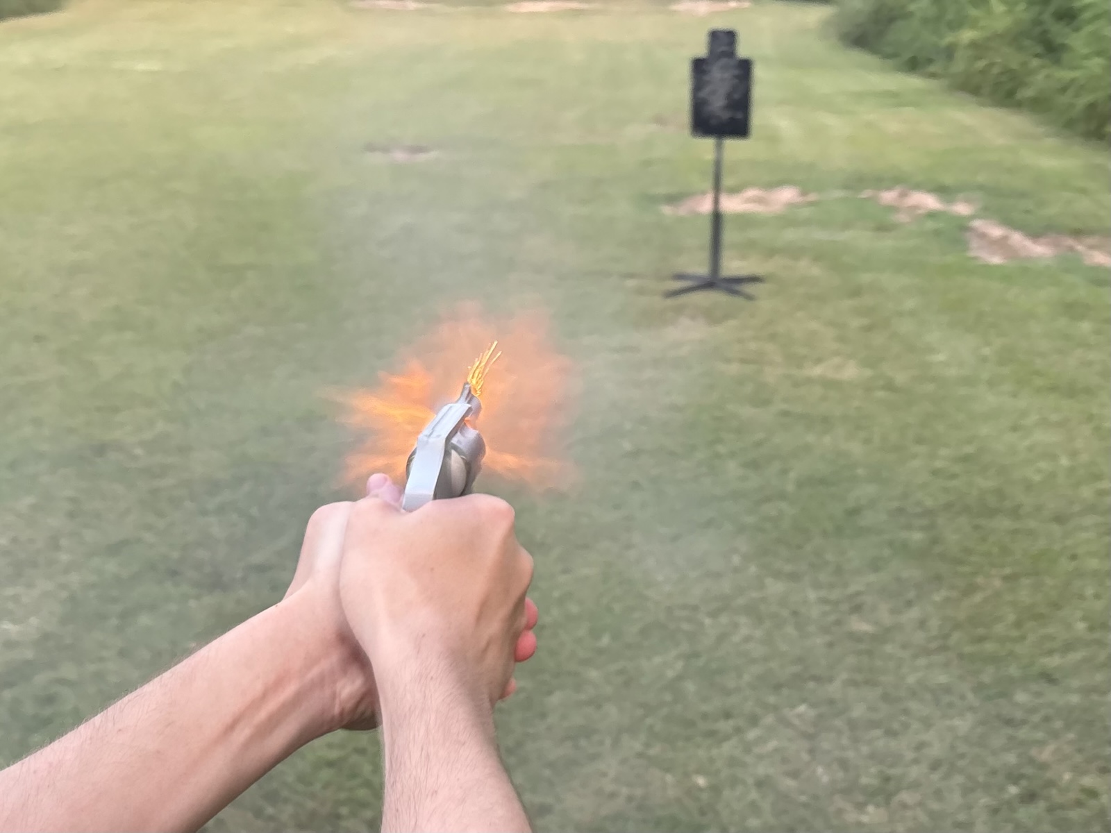 Why does hand placement matter on a snub-nosed revolver?