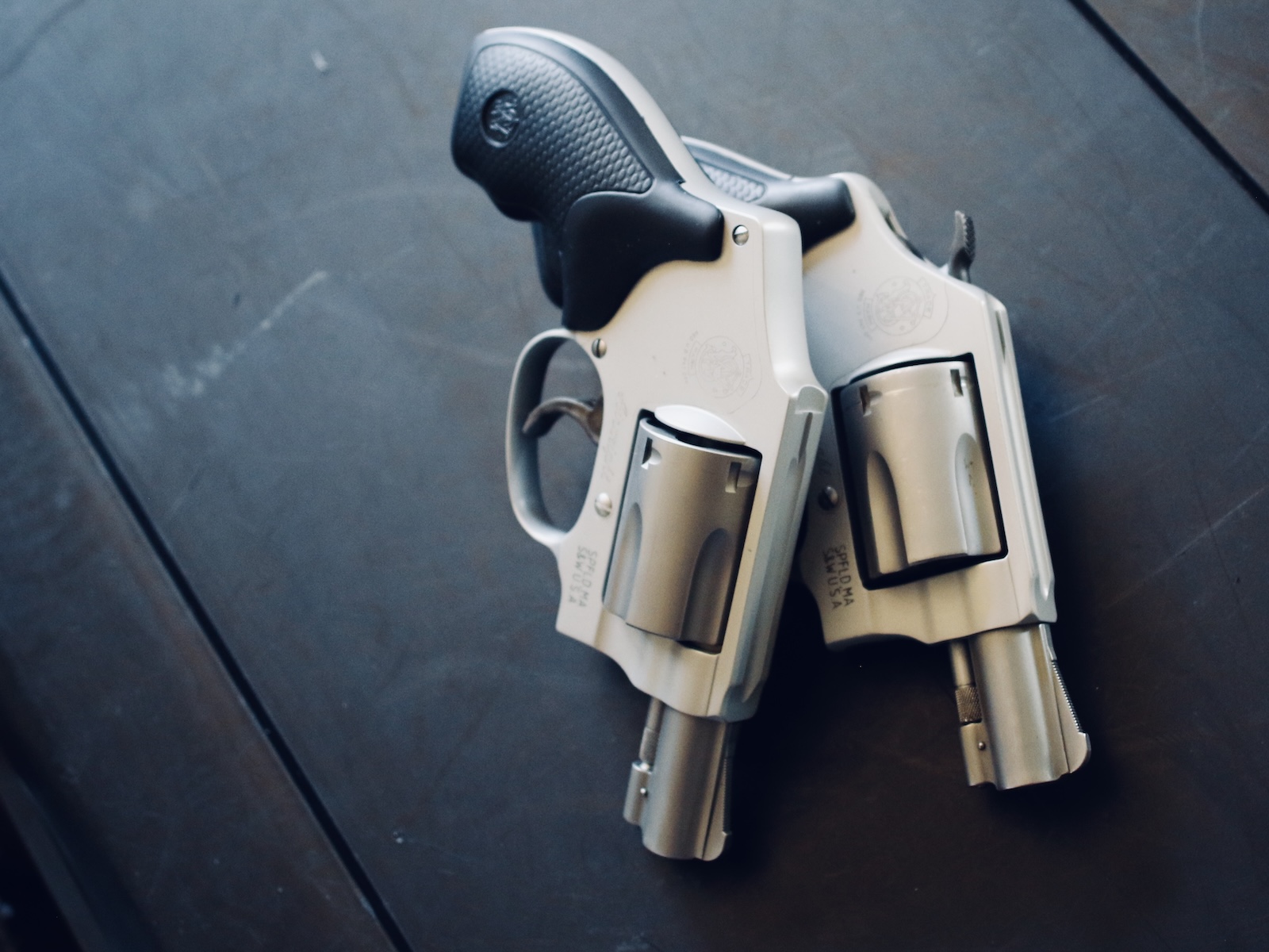 S&W makes many variations on the J-Frame revolvers, even in the same caliber. These two are identical, except one is hammerless DAO.
