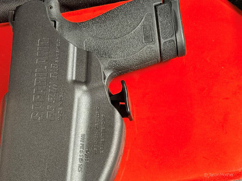 The GLS locking lever positioned just behind the trigger guard on the 575 Pro-Fit holster