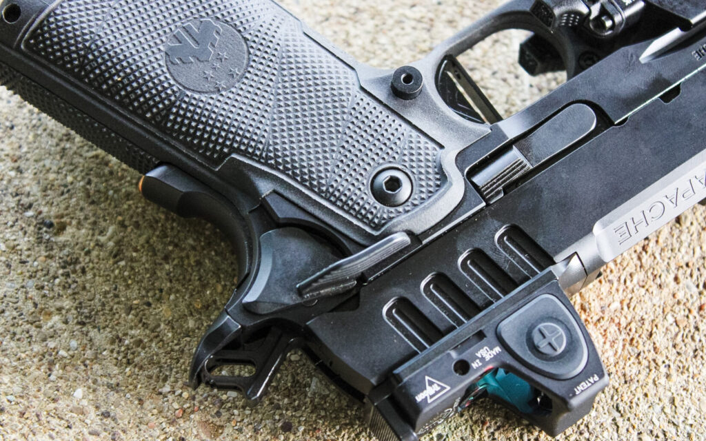 Close-up of the Watchtower Apache Commander's controls, including the threaded magazine release