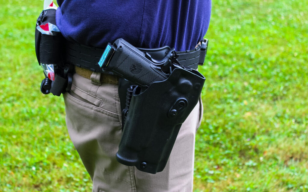 The Watchtower Apache Commander holstered in a Safariland 6354RDSO ALS holster with QLS 19 fork