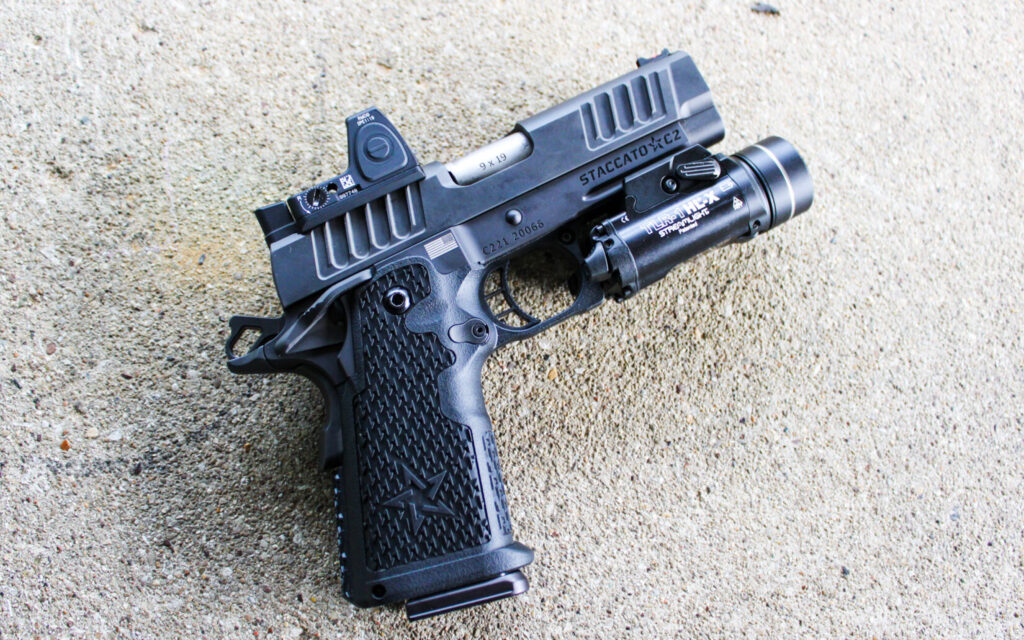 Staccato C2 on a concrete bench showing its grip texturing and slide serrations