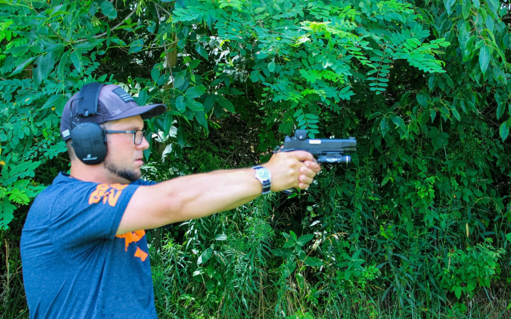 Man shooting a pistol.