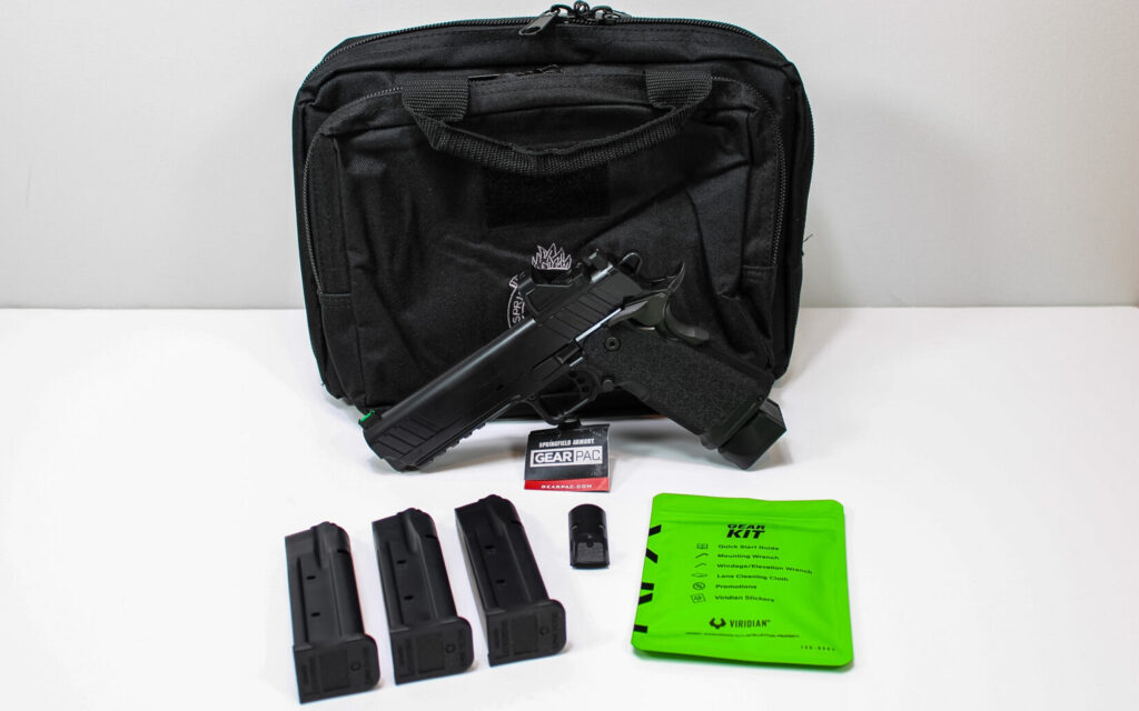 The Springfield Prodigy Gear Pac laid out with its included magazines, optic, and pistol bag