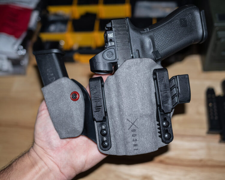 incog x left hand with Glock 19 and trijicon red dot