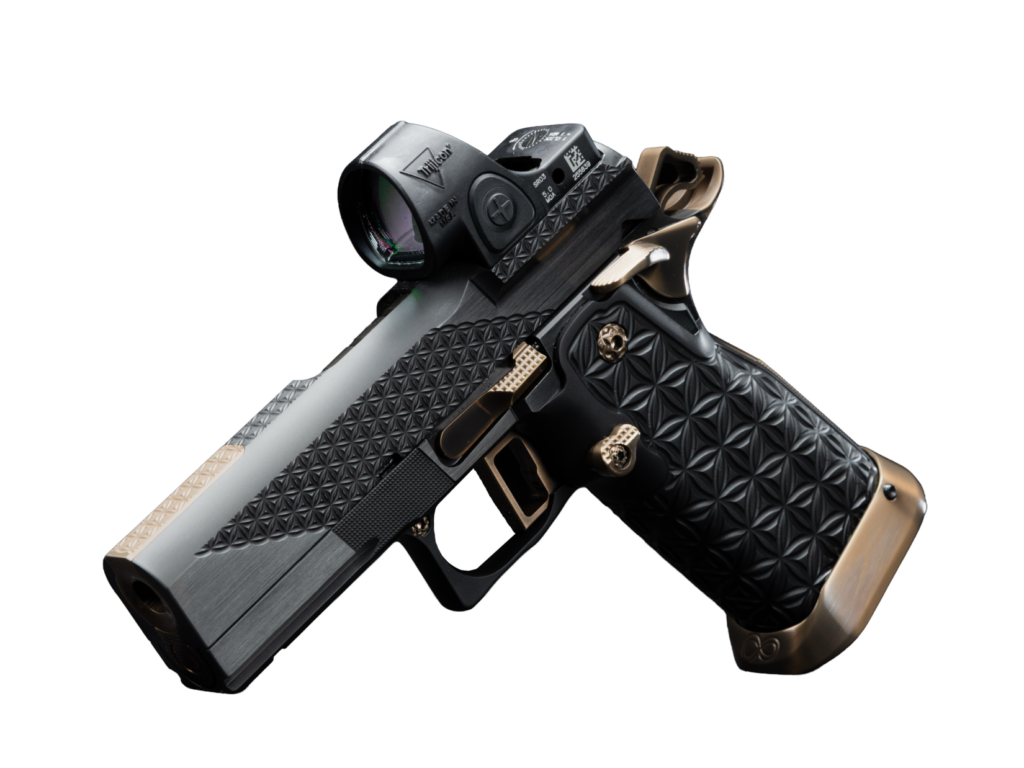 A two-tone Infinity Firearms 2011-style pistol with bronze PVD controls, diamond-textured slide and grip, and a Trijicon SRO red dot optic.