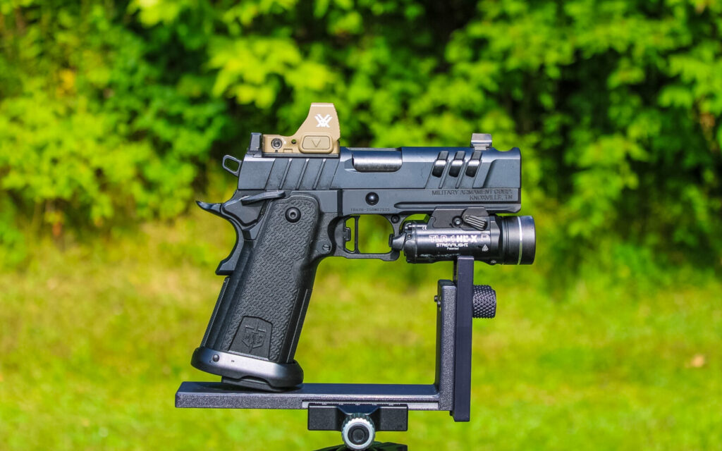The SDS Imports MAC 9 DS Comp, showing its ergonomics and simple, no-frills aesthetics