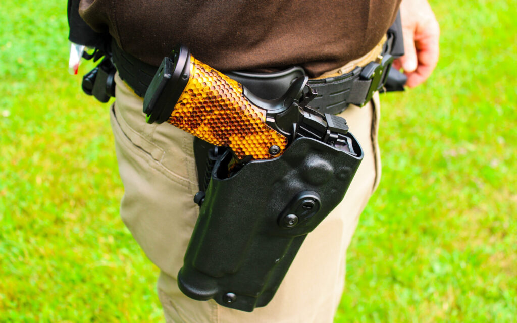The MasterPiece Arms DS9-TC Hybrid holstered in a Safariland 6354RDSO ALS holster
