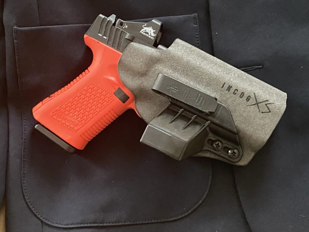 Mantis TitanX with Pink Rhino Red Dot in Safariland INCOG XS holster