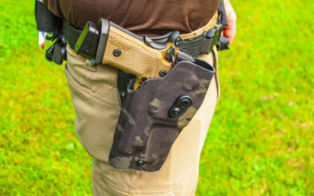 The Sig P211 GTO Combat holstered in a Safariland 6390RDSO ALS Mid-Ride holster
