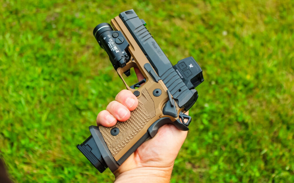 hand holding the Sig P211 GTO Combat