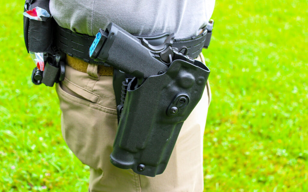 The Springfield Prodigy holstered in a Safariland 6354RDSO ALS Holster with QLS19 Fork