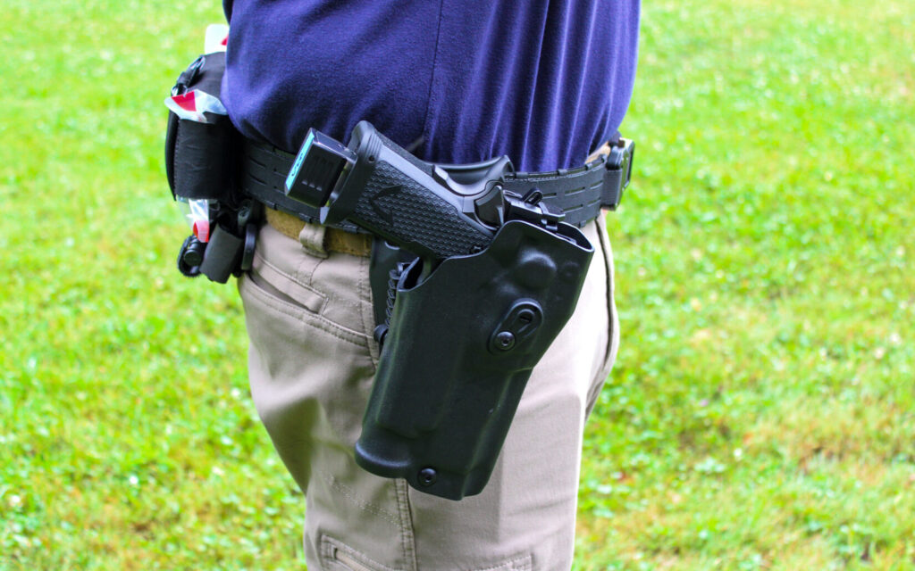 The VKTR VKP Pro holstered in a Safariland 6354RDSO ALS holster with QLS 19 fork on a BASELINE MOLLE Belt