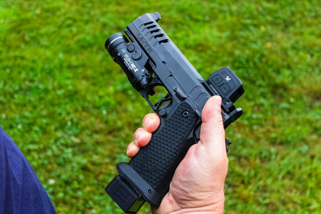 Close-up of the VKTR VKP Pro's grip texturing and slide serrations