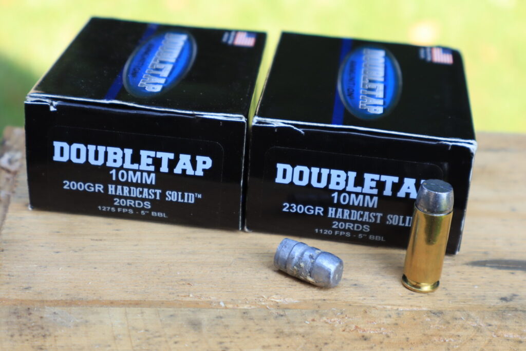 double tap 200 grain and 230 grain ammunition boxes and a recovered bullet