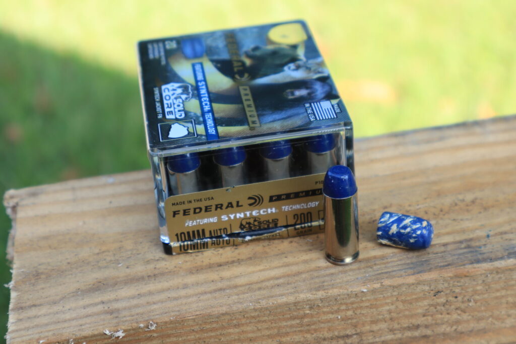 Federal Syntech 10mm ammunition box and recovered bullet