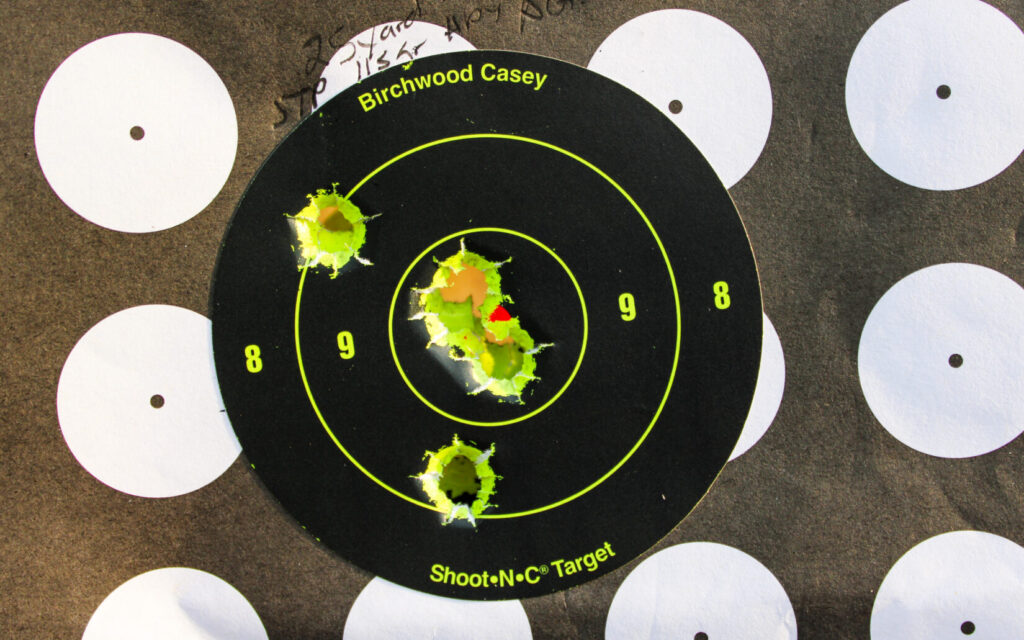 Twenty-five-yard target showing a five-shot group just over 1.5 inches fired from the STP S.W.A.T.