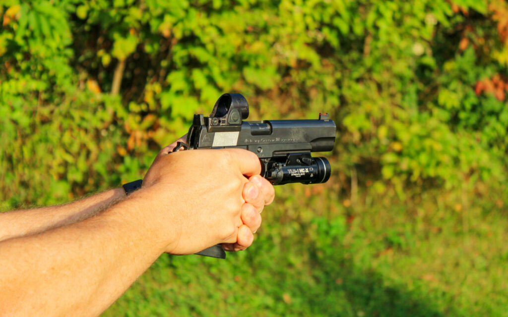 A man shooting the Quantico HiCap.