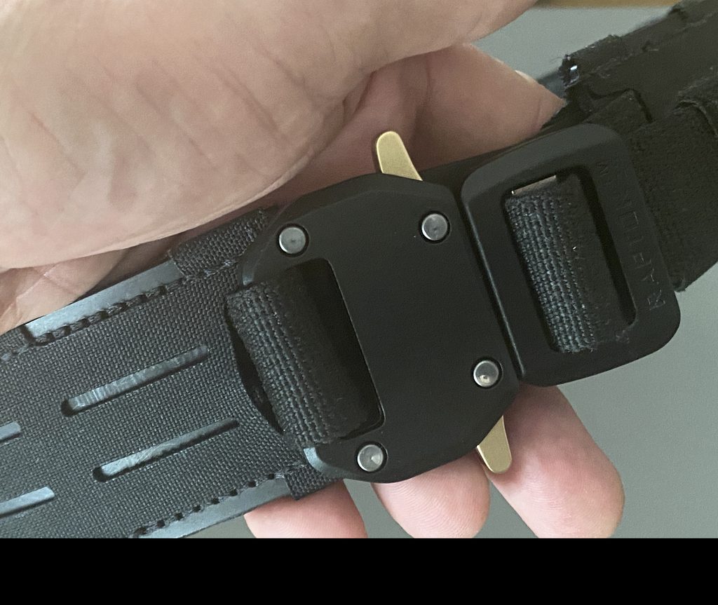 Close-up of the BASELINE MOLLE Belt's Raptor buckle and Overlock Tab Closure System