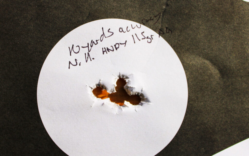 Ten-yard accuracy target showing a tight five-shot cluster just over three-quarters of an inch.