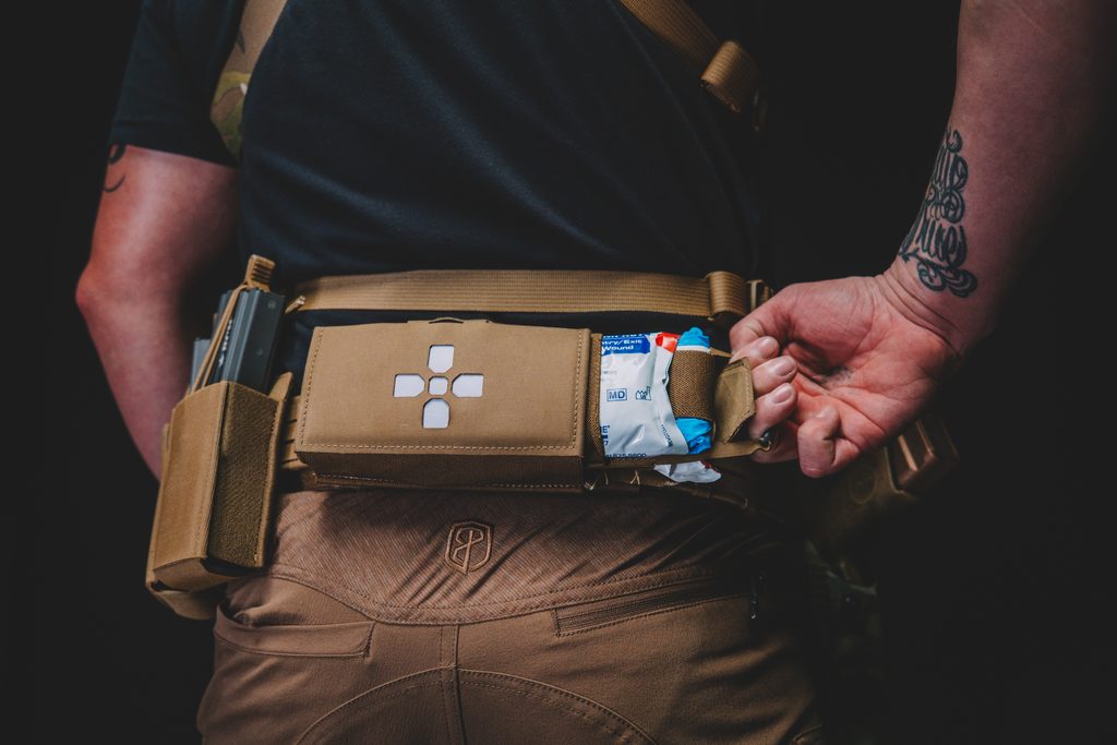 Pulling the ITRK medical tray out by one of its rubberized closed-loop handles
