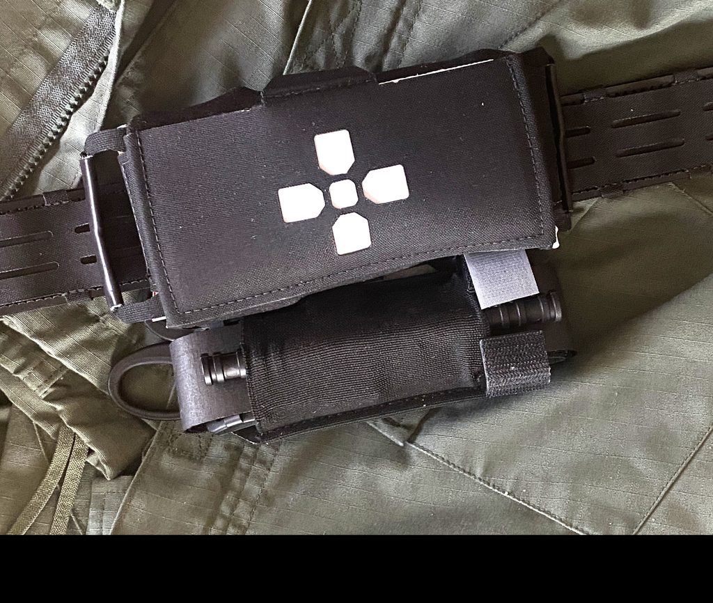 The Haley Strategic ITRK mounted on a BASELINE MOLLE Belt with an HSP TQS Hanger holding a tourniquet and trauma shears
