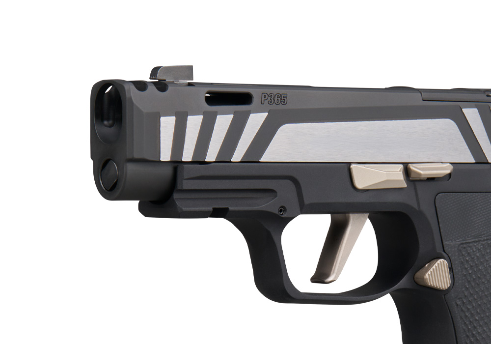 Close-up of the P365-AXG Equinox's two-port integrated expansion chamber, designed to reduce muzzle rise