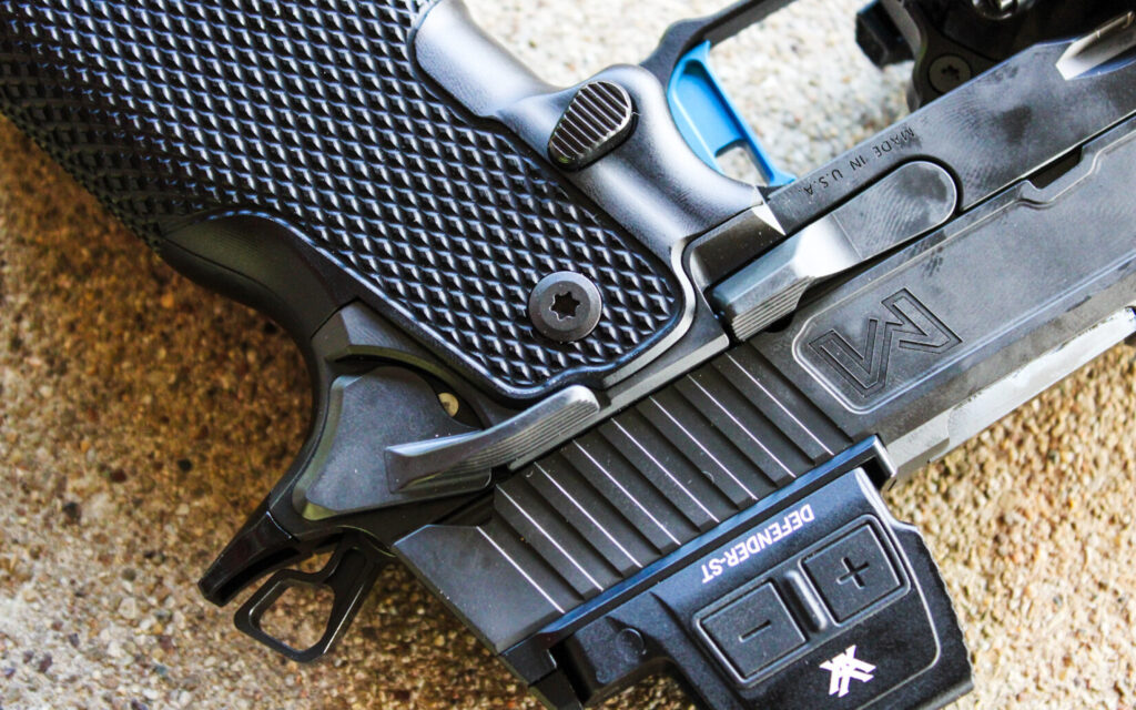 Miller Precision Ranger 9X on a bench, showing the teardrop magazine release and enlarged slide release